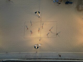 Poster - Top view of tourists playing volleyball on the beach of Tel Aviv,  Israel