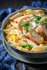 Wall Mural - Homemade and tasty penne with bechamel sauce and corn.