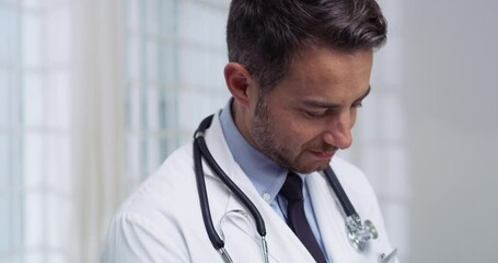 Wall Mural - Tablet, medical and man doctor doing research in hospital before a telehealth consultation. Technology, face and closeup of male healthcare worker doing online analysis on mobile in a medicare clinic