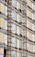 Wall Mural - High rise residential building of flats with cladding being replaced with fire resistant materials