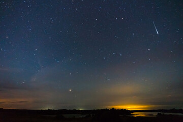 starry night sky, falling star and big dipper