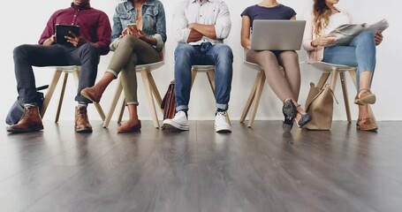 Canvas Print - Technology, queue and closeup of people in a waiting room for a with human resources meeting in office. Recruitment, hiring and candidates sitting in a line or row for job interview in the workplace.