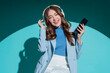© whyframeshot - carefree smiling peaceful moment Asian female woman listen music playlist smartphone wireless headphone smart casual device technology ,woman hand choosing playlist from application leisure lifestyle