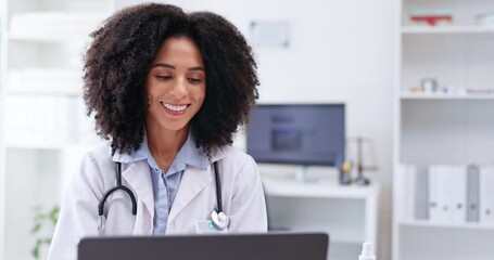 Smile, woman and doctor at laptop in clinic, planning research and reading online report. Face, happy female healthcare employee and working at computer, medical analysis and telehealth in hospital