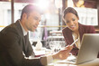 © KOTO - Business people working in restaurant