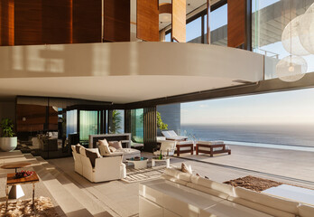 Wall Mural - Living room in modern house overlooking ocean