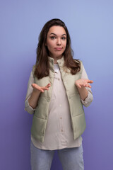 Sticker - young brunette woman upset and in doubt over isolated background