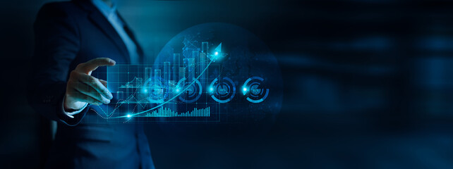 Leinwandbilder - Businessman analyzing finance business data graph, Stock investment and calculating financial data for investment growth target and company balance sheet, Strategy for perceptive business decision.