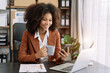 © NINENII - Business email marketing notification concept, Businesswoman use smartphone and laptop receive message alert in the mailbox and transfer data at home office.
