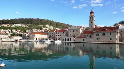 Canvas Print - Panorama of Pucisca small city on Island Brac - Croatia. Shoot from the shore.