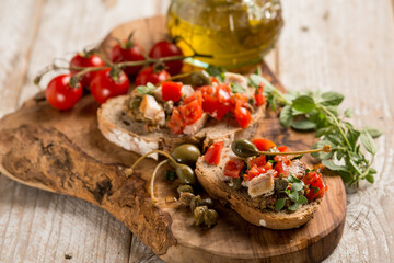 Poster - italian bruschetta with swordfish caper and oregano