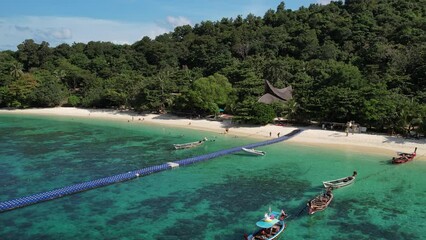 Canvas Print - Aerial view of the forested beach of the Phuket island on a sunny day