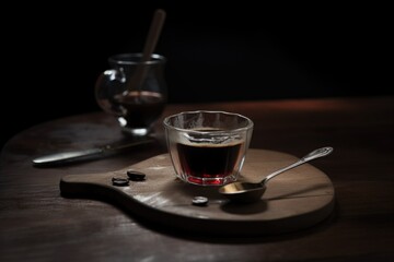 Canvas Print - coffee break ritual, with shot of espresso and miniature spoon for stirring, created with generative ai