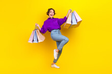 Full Length Body Photo Of Young Carefree Addicted Shopaholic Woman Wear Formal Clothes Hold Bags Boutique Isolated On Yellow Background