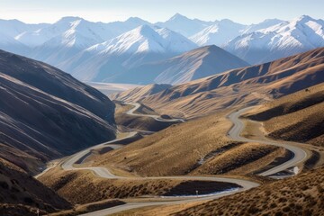 Wall Mural - snow-capped peaks in the distance, with a winding road leading to them, created with generative ai