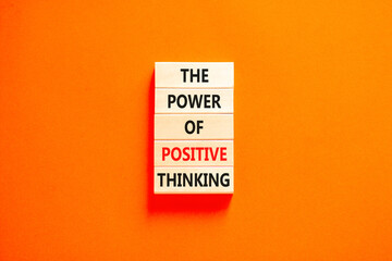 Wall Mural - Positive thinking symbol. Concept words The power of positive thinking on wooden block. Beautiful orange table orange background. Business, motivational positive thinking concept. Copy space.