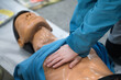 © Peter Heckmeier - close up of a person receiving a massage breathing student injury nurse urgency treatment human skill attack massaging technique safe save oxygen breath exam instruction professional respiratory cours