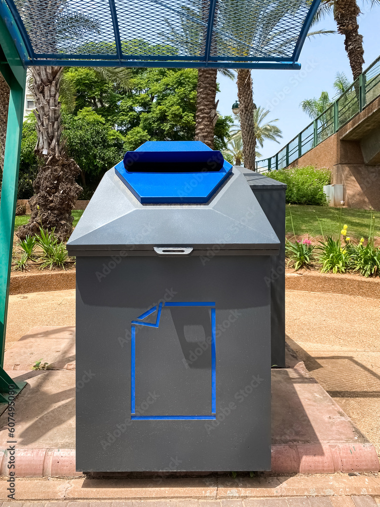 Paper recycling container on city street