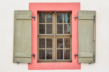 Wall Mural - view of old building with wooden window and shutters