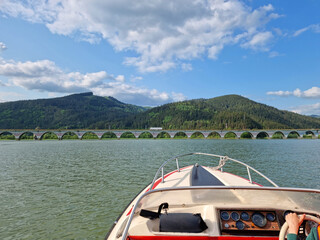 Wall Mural - boat on the lake, water and clear blue sky