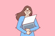 © drawlab19 - Geek woman with laptop hugs favorite gadget with blank screen rejoicing at opportunity to learn via internet. Young geek girl loves computers and is well versed in modern technologies.