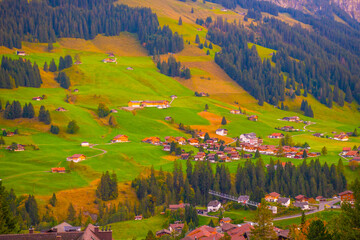 Wall Mural - Colorful summer view of Switzerland village. Beautiful outdoor scene in Swiss Alps, Bernese Oberland in the canton of Bern, Switzerland, Europe.