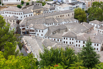 Wall Mural - Cityscape of Gjirokaster old town, Albania. Christian church and old ottoman houses in Gjirokaster, Albania close-up