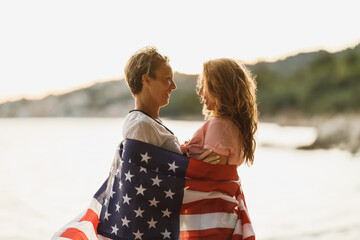 Sticker - Two Women With American National Flag Spending Day On A Beach