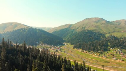 Wall Mural - Aerial view Bakhmaro village panorama in summer. FAmous travel landmark summer resort in caucasus mountains. Holiday destination in Guria, Caucasus