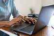 © snowing12 - Close up hands of businesswoman typing data on laptop keyboard while working on the desk in office