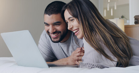 Poster - Happy, couple and watching movie on laptop in bedroom for online subscription, media download or relax together. Young man, woman and computer technology for streaming, internet or connection at home