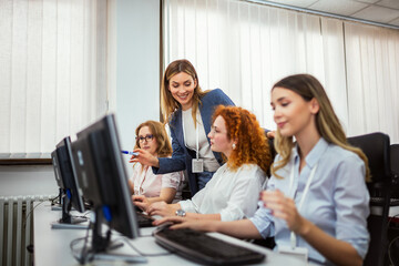 educator and students in programming school
