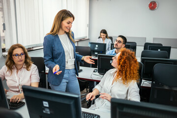 educator and students in programming school