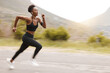 © Anela R/peopleimages.com - Athlete, speed and fast black woman running and training for outdoor sports, workout and exercise for a marathon. Strong, wellness and healthy fitness person or female runner with speed for health