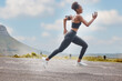 © Anela R/peopleimages.com - Athlete, wellness and fast woman running and training for outdoor sports, workout and exercise for a marathon. Strong, fitness and healthy female person or runner with speed, sprint and health