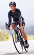 © Michael C/peopleimages.com - Fitness, woman and cyclist training, wellness and workout with exercise, wellness and endurance. Female person, biker and athlete in the street, cycling and biking with speed, energy and adventure