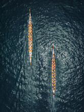 Aerial View Of People Paddling With Long Kayak For Competition In Hong Kong Bay, China.