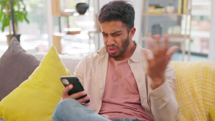 Frustrated, anger and man with a cellphone, home or confusion with stress, mistake or error. Angry, male person or guy with a smartphone, mobile app or glitch with frustration, lounge or social media