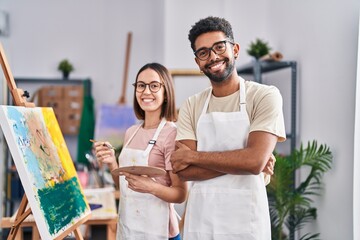 Poster - Man and woman artists smiling confident drawing at art studio