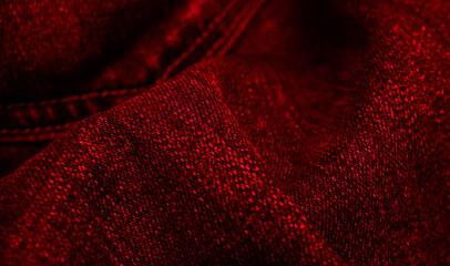 Canvas Print - red jeans with a visible interesting texture. background