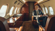 © PaulShlykov - Smiling businessman looking at window in private plane. Business jet interior. Generative AI