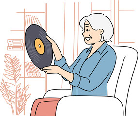 Smiling mature woman with vinyl record at home