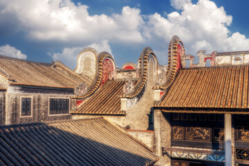 Wall Mural - Zumiao Ancestor's Temple is a Daoist temple in Foshan, Guangdong, China. The temple was converted into Municipal Museum and listed as one of the main cultural relics. Typical Lingnan style roofs. 