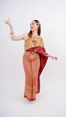 Young lady wearing typical, traditional Thai dress with identity Thai culture smiling isolated on white background