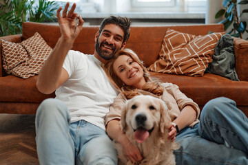 Wall Mural - Couple with dog at home