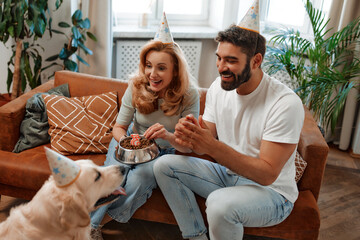 Wall Mural - Couple with dog at home