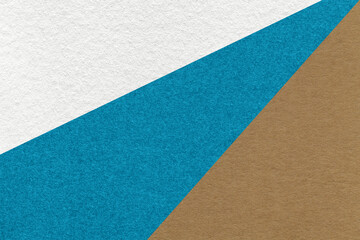 Texture of old craft white, blue and brown color paper background, macro. Structure of vintage abstract cardboard