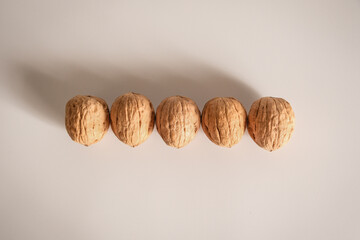 Shelled walnuts. Being smart vs. stupid. Accurate solutions lead to success, efficiency, smartness, cleverness let you avoid complications and hard work.