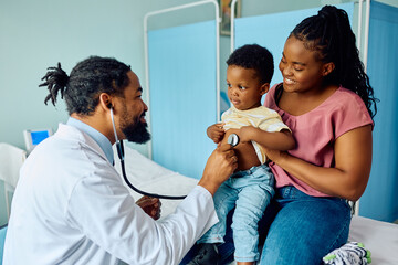 Wall Mural - Small black boy during medical examination at pediatrician's office.