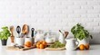 © Godam - Kitchen utensils, cooking ingredients and kitchenware on white counter table. Generative AI